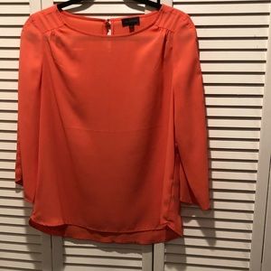Orange long sleeve top